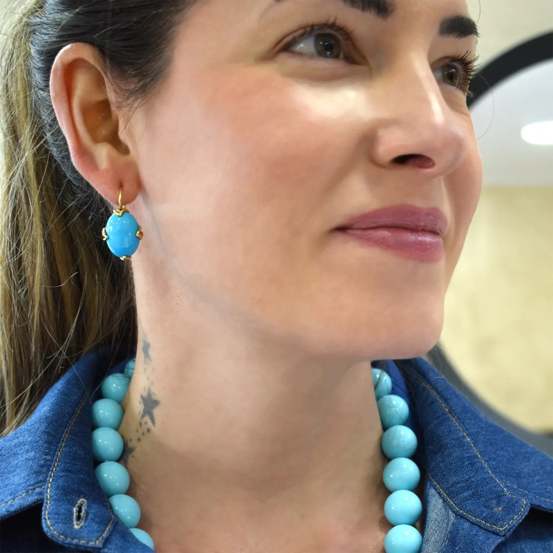 Pendientes colgantes ovalados de turquesa en oro amarillo de 18 kt
