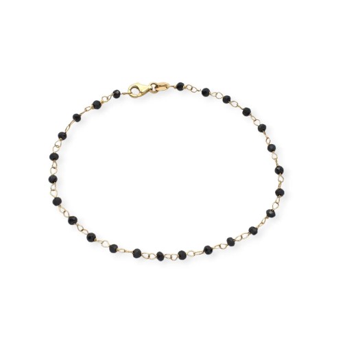 Pulsera con espinelas negras facetadas en oro amarillo de 18 quilates