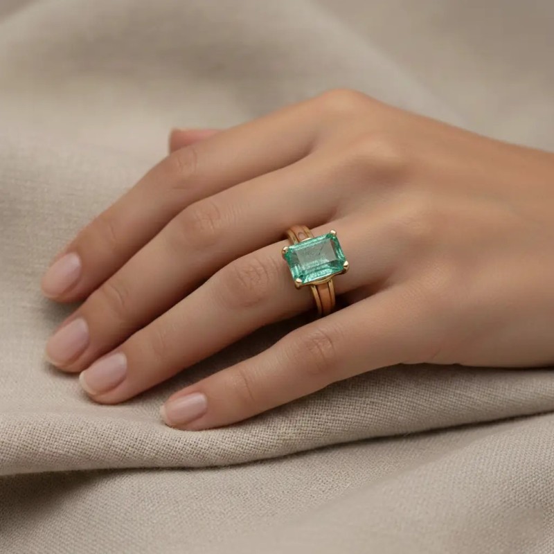 Ring aus 18-karätigem Gelb- und Roségold mit achteckigem Smaragd (2,56 ct)