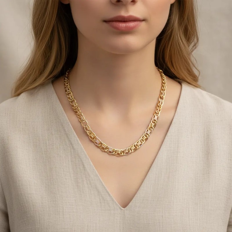 Collar de oro amarillo de 18 kt con elementos moleteados tricolores