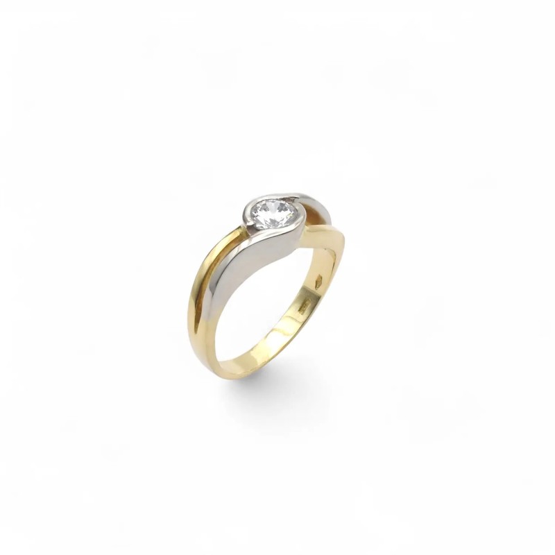 Anillo de oro amarillo y blanco de 18 kt con circonita central
