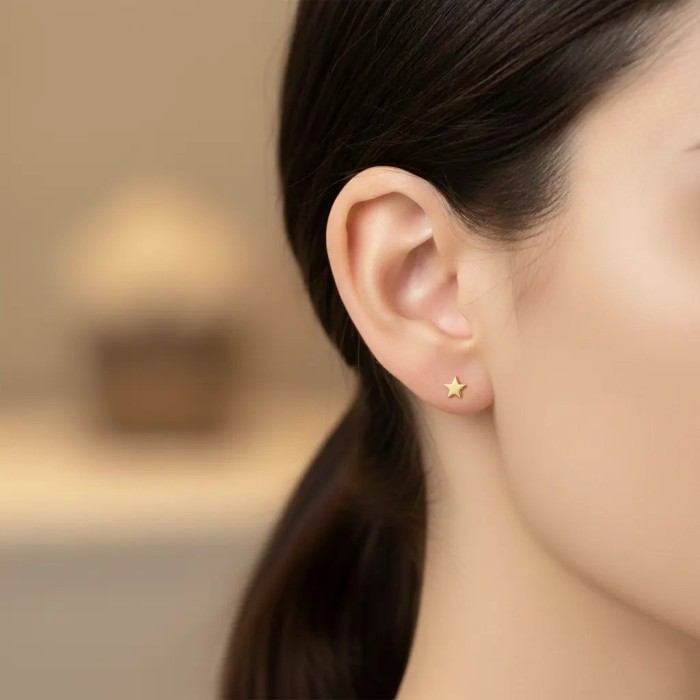 Pendientes de estrella en oro amarillo de 18 kt | Ø 5 mm 2