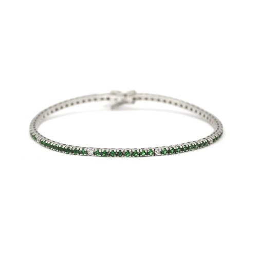 White gold tennis bracelet with emeralds and diamonds