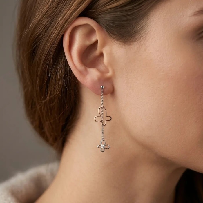 Pendientes de mariposa en oro blanco y rosa con diamantes de 0,10 ct. 2