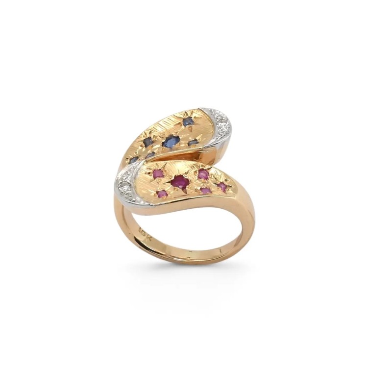 Anillo Contrarié de oro amarillo de 18 kt con zafiro, rubí y diamantes