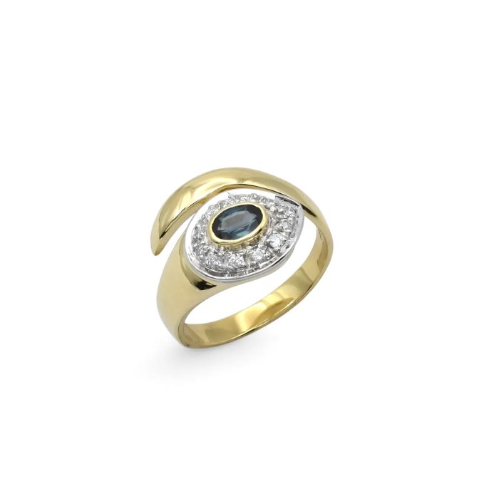 Anillo bicolor de oro de 18 kt con zafiro ovalado y diamantes