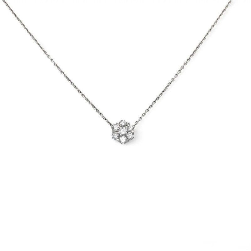 Cadena de oro blanco con modelo mágico central.