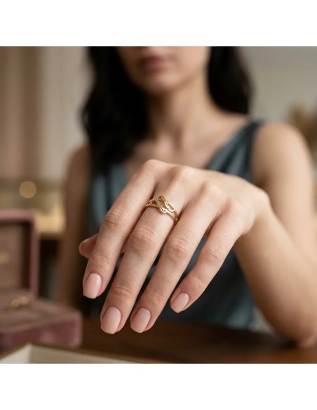 Anello "Intreccio Sinuoso" in Oro Giallo 18kt