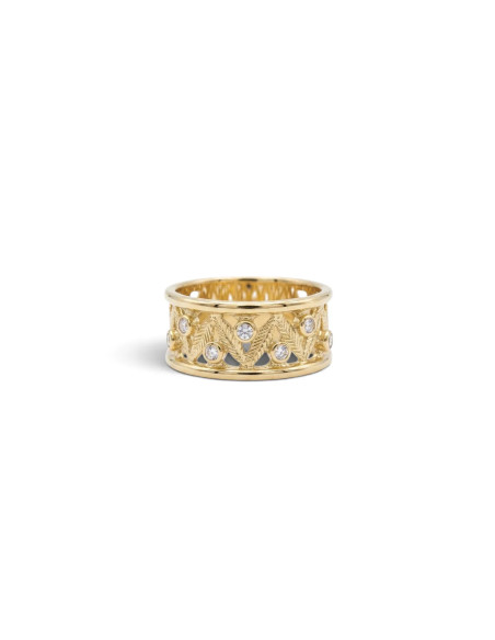 Anillo de oro amarillo de 18 quilates con diseño floral.