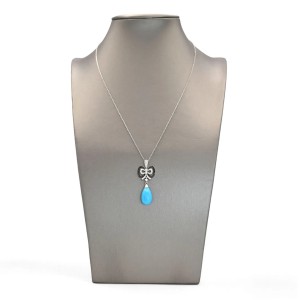 Colgante de oro blanco de 18 kt, diamantes blancos y negros con turquesa natural